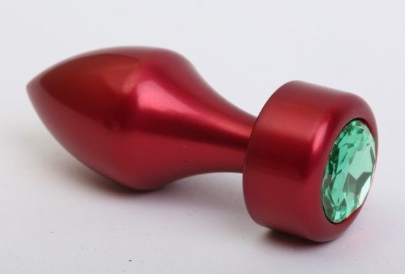 Купить Красная анальная пробка с широким основанием и зелёным кристаллом - 7,8 см. в Москве.